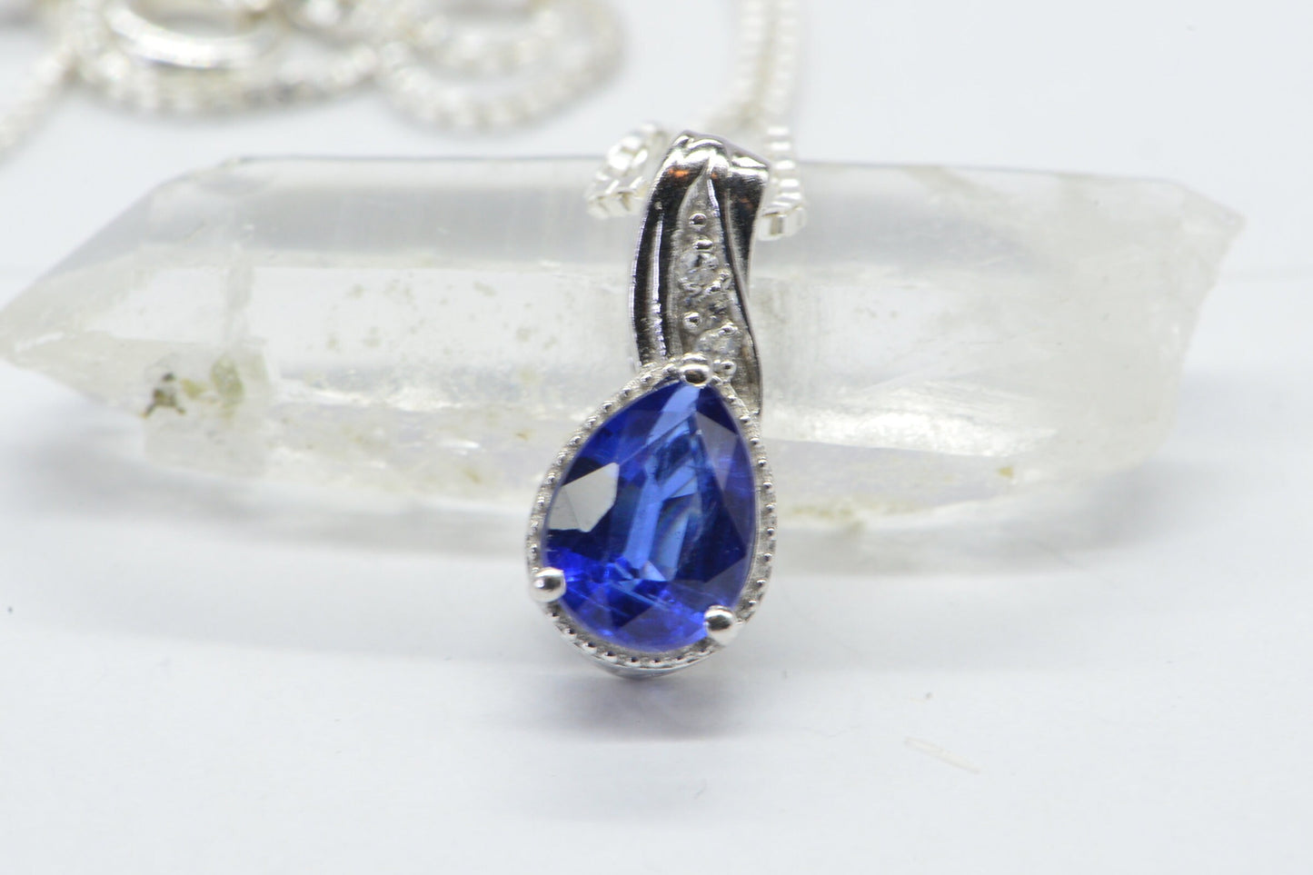 Lab Sapphire Pear Pendant: Illusion Diamond Halo, Sterling Silver