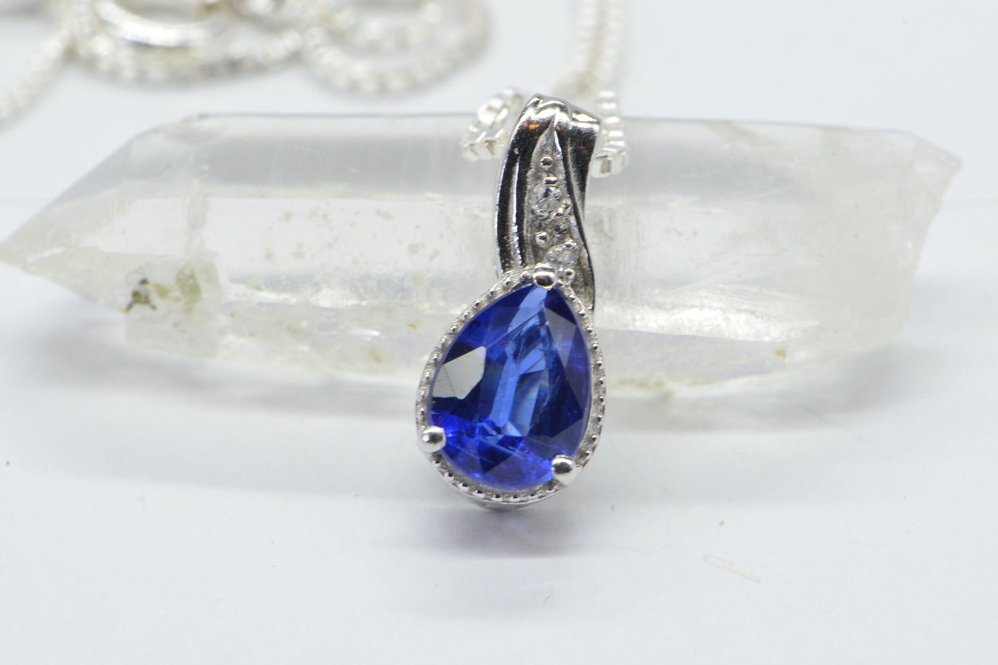 Lab Sapphire Pear Pendant: Illusion Diamond Halo, Sterling Silver