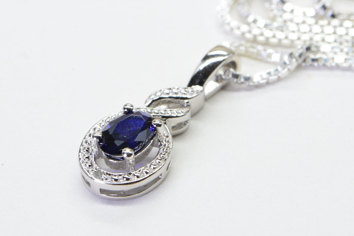 Sapphire Pear Pendant: Diamond Halo, Sterling Silver, September Birthstone