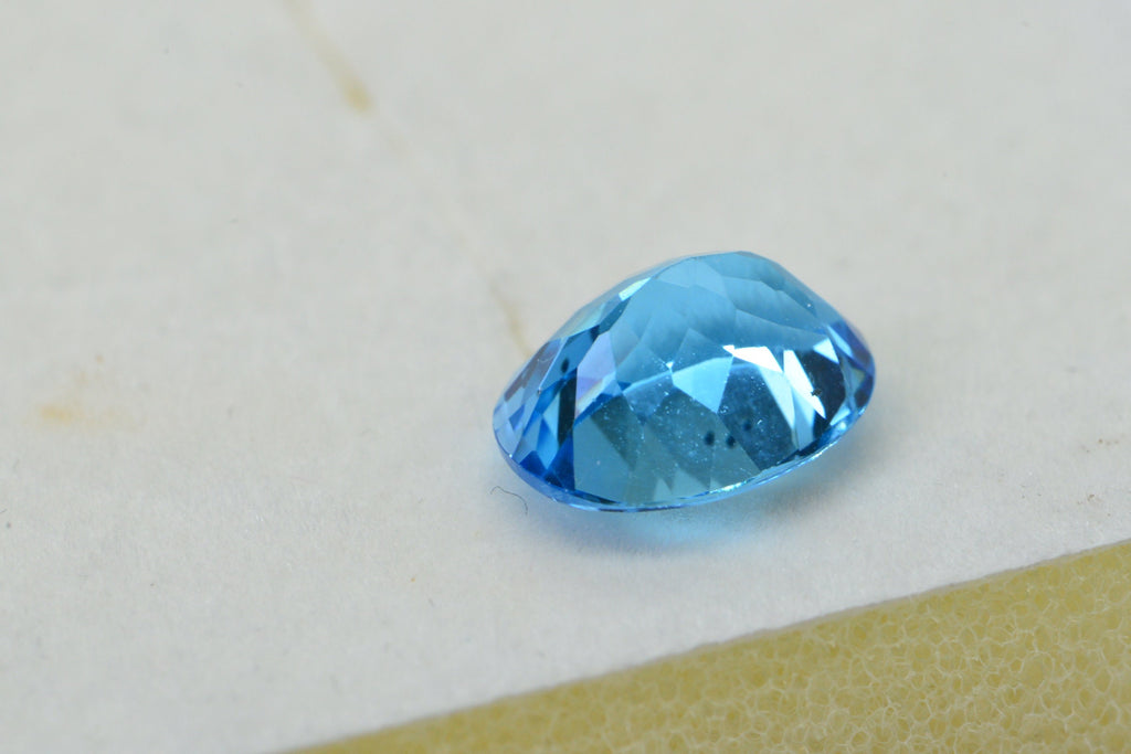 AAA Blue Topaz: Oval Faceted November Birthstone (8X10X5.2mm)