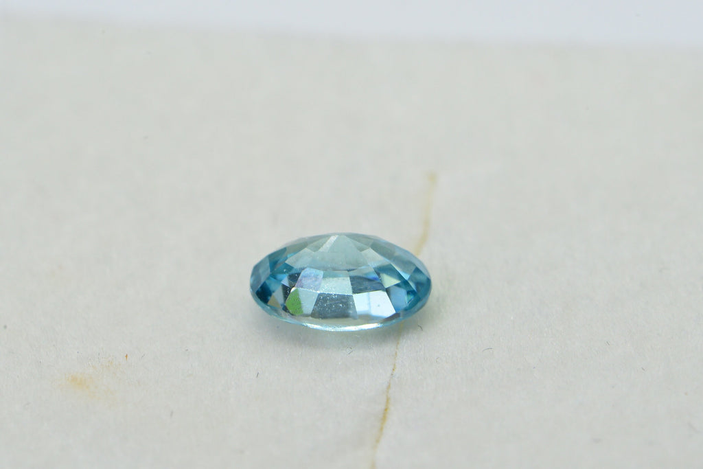 Aqua Blue Topaz: Oval Faceted Cabochon, November Birthstone
