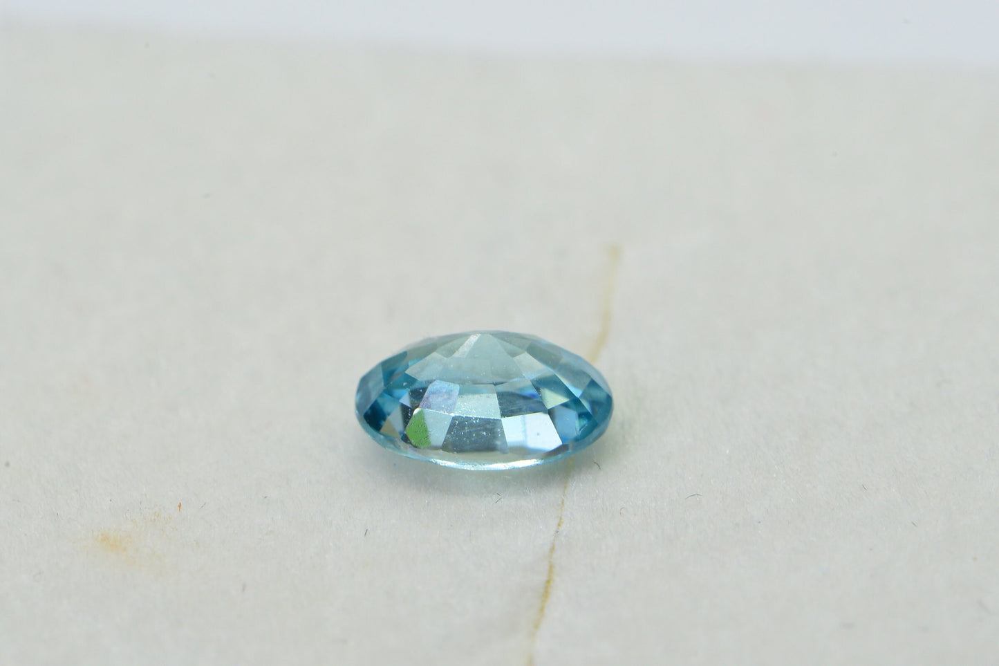 Aqua Blue Topaz: Oval Faceted Cabochon, November Birthstone