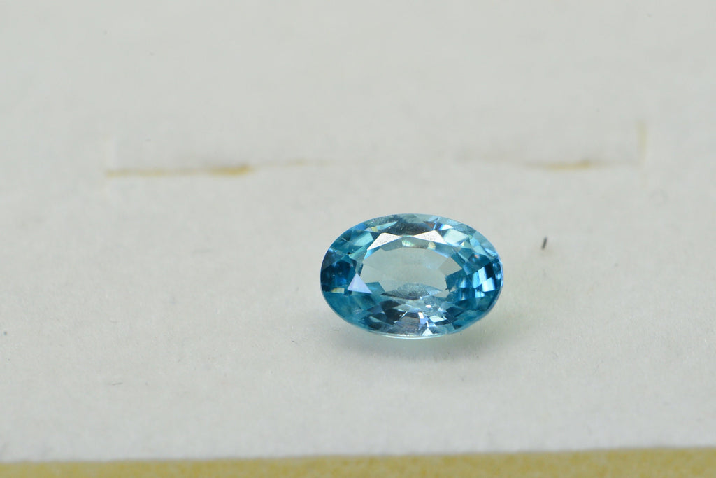 Aqua Blue Topaz: Oval Faceted Cabochon, November Birthstone