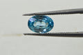 Aqua Blue Topaz: Oval Faceted Cabochon, November Birthstone