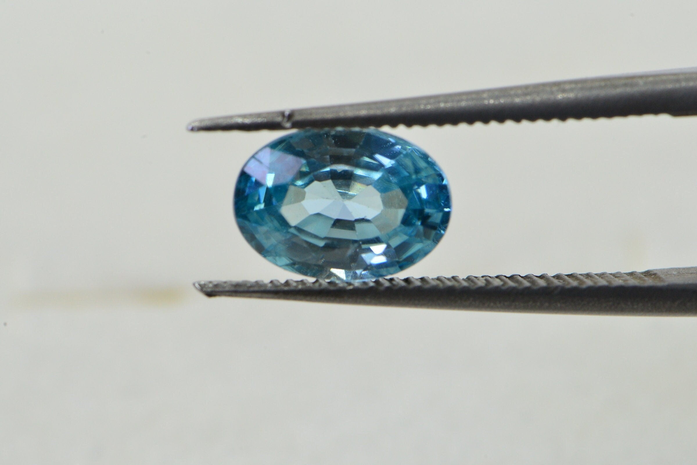 Aqua Blue Topaz: Oval Faceted Cabochon, November Birthstone