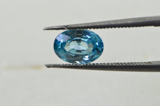 Aqua Blue Topaz: Oval Faceted Cabochon, November Birthstone