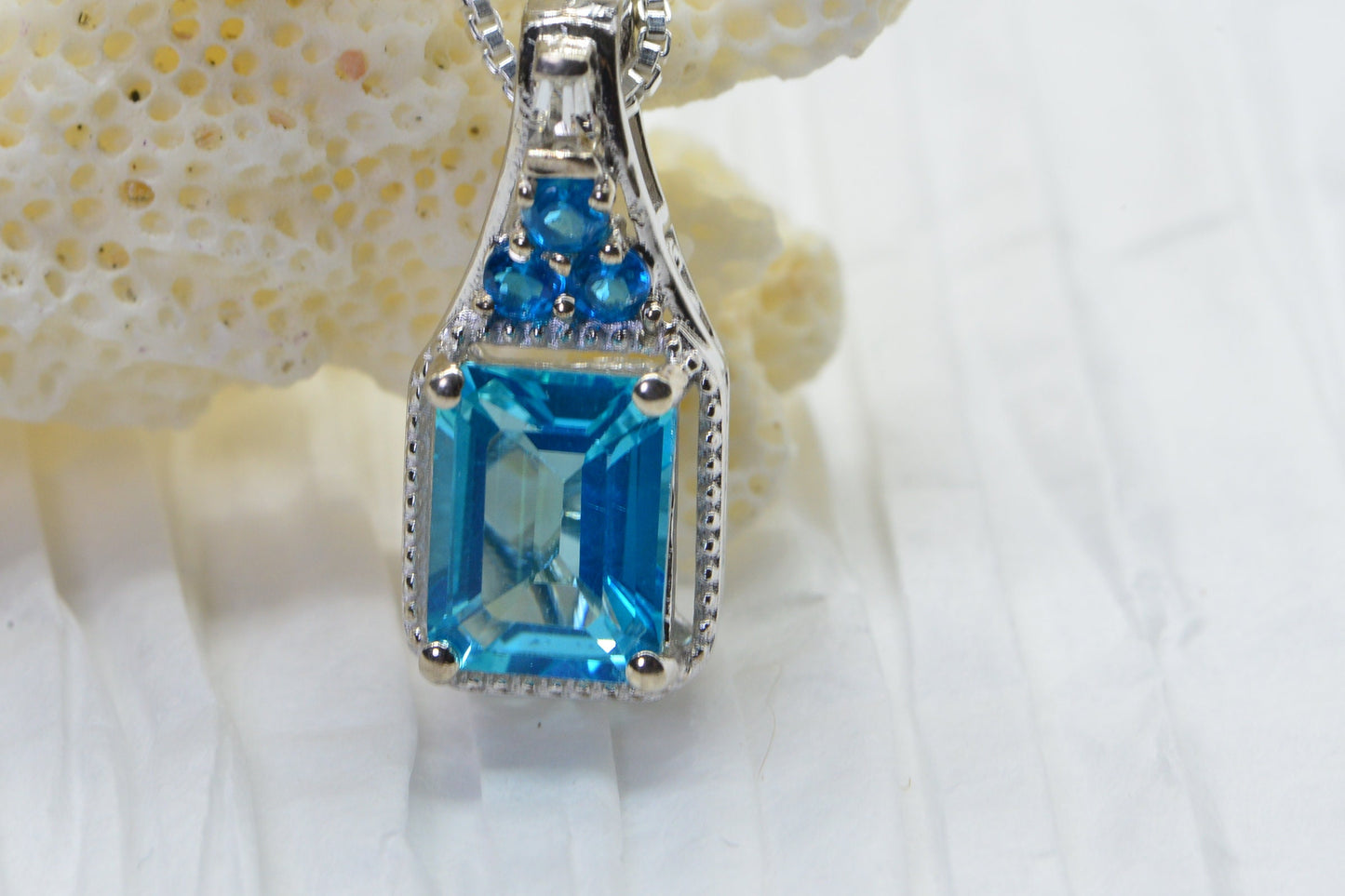 Emerald Cut Blue Topaz Sterling Silver Pendant Necklace - Halo Style