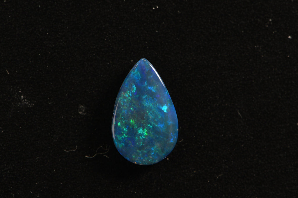 Australian Black Opal Doublet: Pear Cabochon Gemstone, 0.45ct