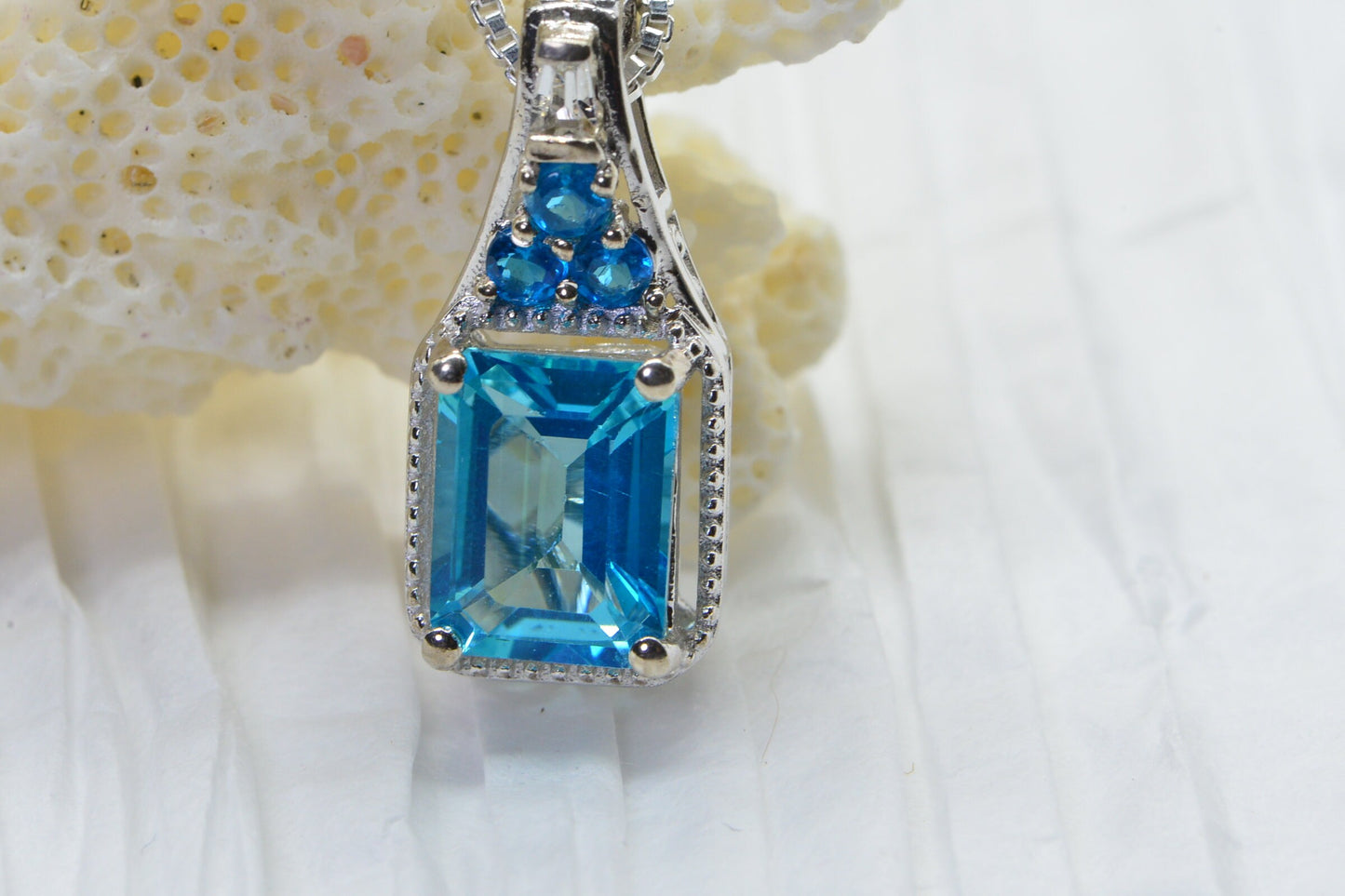 Emerald Cut Blue Topaz Sterling Silver Pendant Necklace - Halo Style