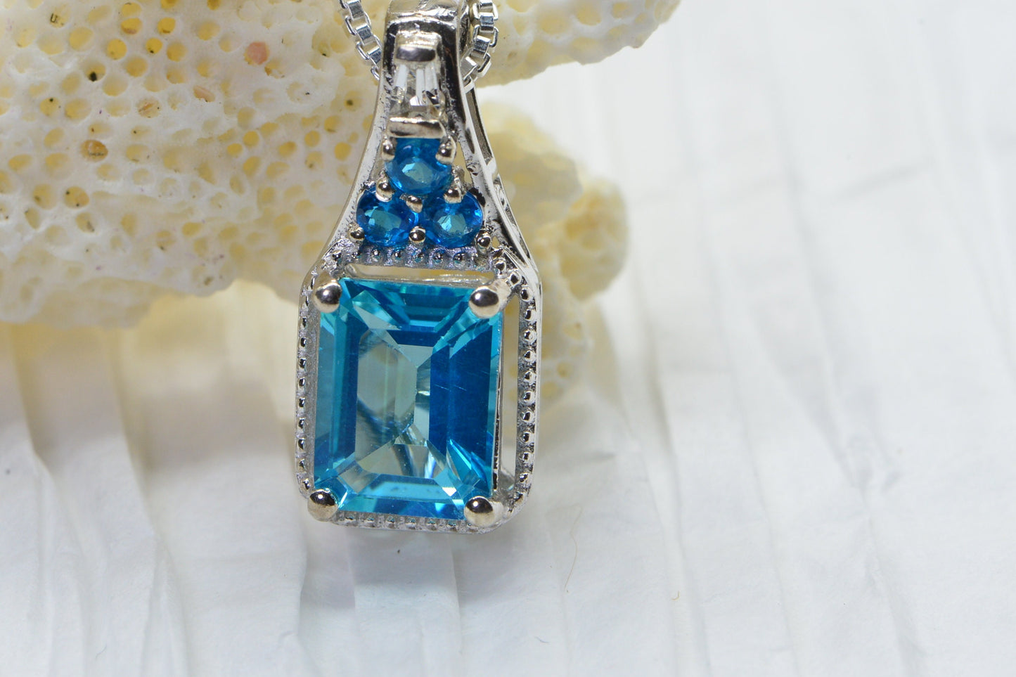 Emerald Cut Blue Topaz Sterling Silver Pendant Necklace - Halo Style
