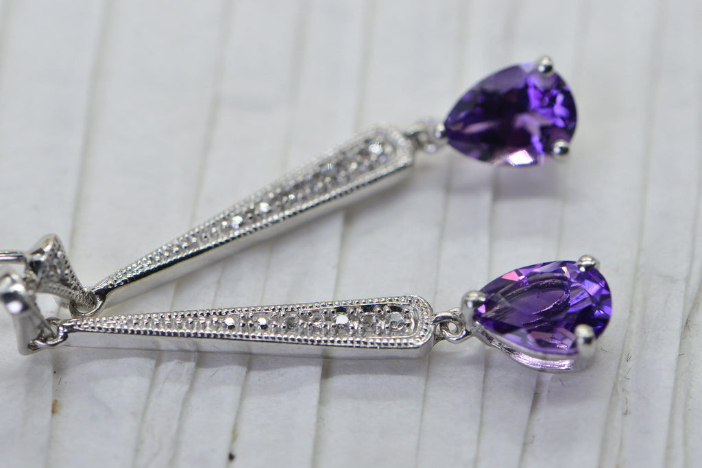 Amethyst Teardrop Earrings: Sterling Silver Studs with Diamond Accent
