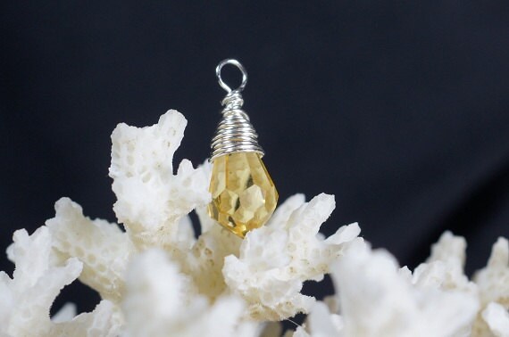 Yellow light Topaz Crystal Wire Wrapped Briolette.