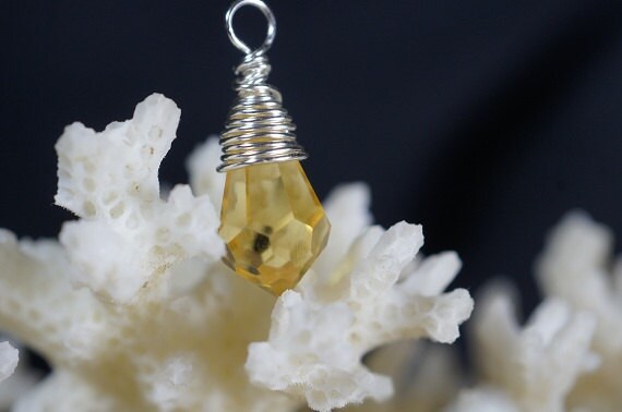 Yellow light Topaz Crystal Wire Wrapped Briolette.