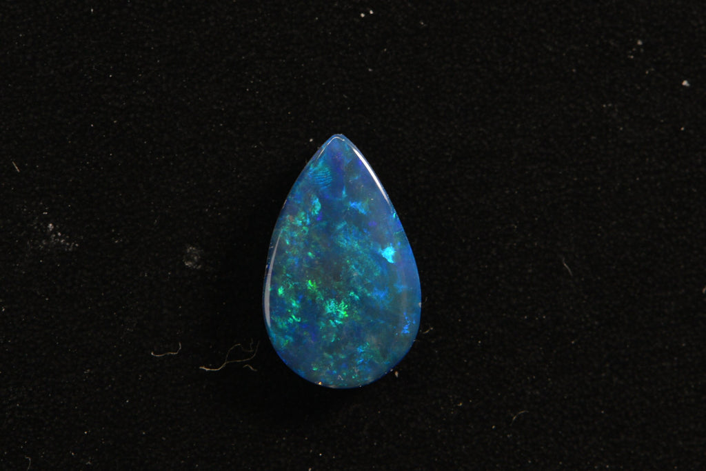 Australian Black Opal Doublet: Pear Cabochon Gemstone, 0.45ct