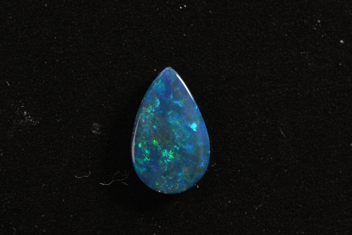 Australian Black Opal Doublet: Pear Cabochon Gemstone, 0.45ct