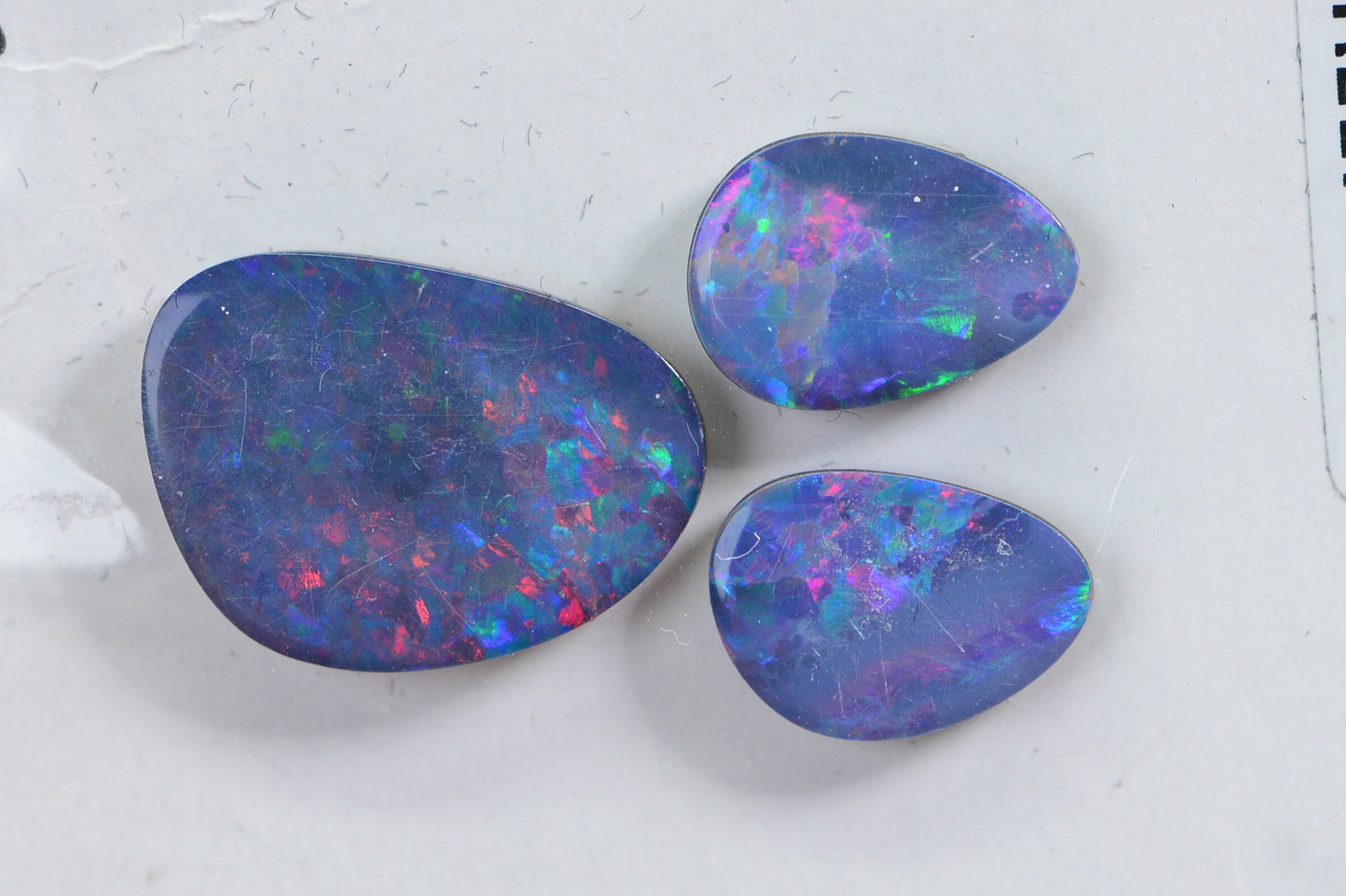 5.52ct 3 stone Australian Black Opal Metallic Rainbow Freeform long Teardrop