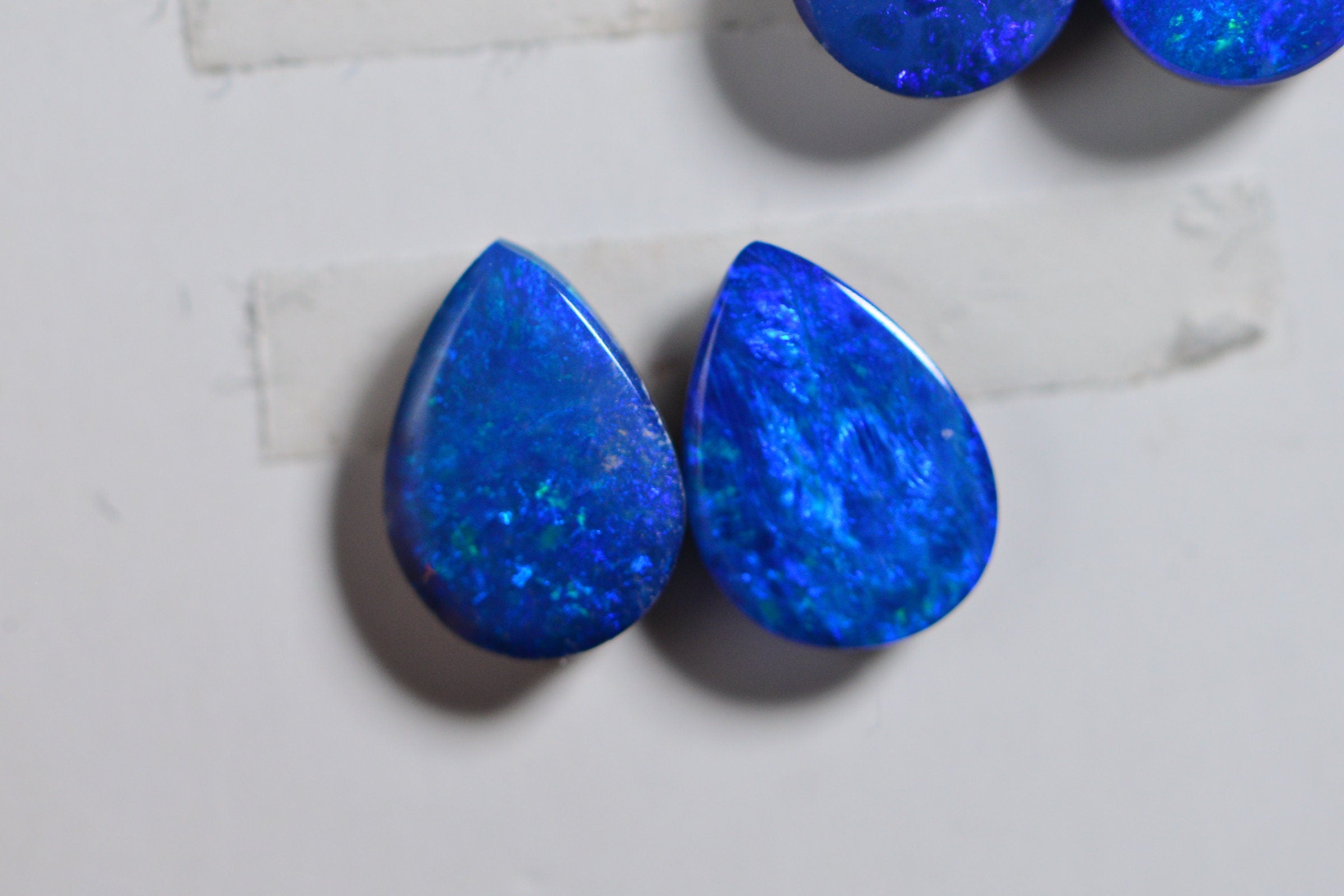 Australian Black Opal Doublet Pair: Blue Pear Cabochons (7X5mm)