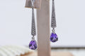 Amethyst Teardrop Earrings: Sterling Silver Studs with Diamond Accent
