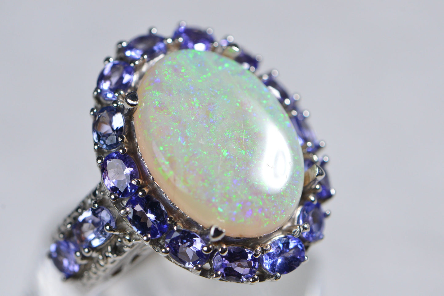 Australian White Opal Ring: Sterling Silver Halo, Tanzanite Accent
