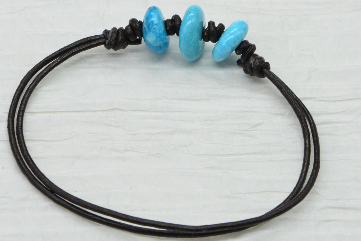 Raw Sleeping Beauty Turquoise Nugget Bracelet: Adjustable Leather Cord