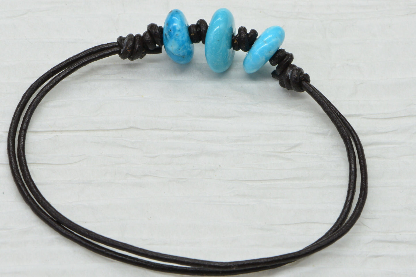 Raw Sleeping Beauty Turquoise Nugget Bracelet: Adjustable Leather Cord