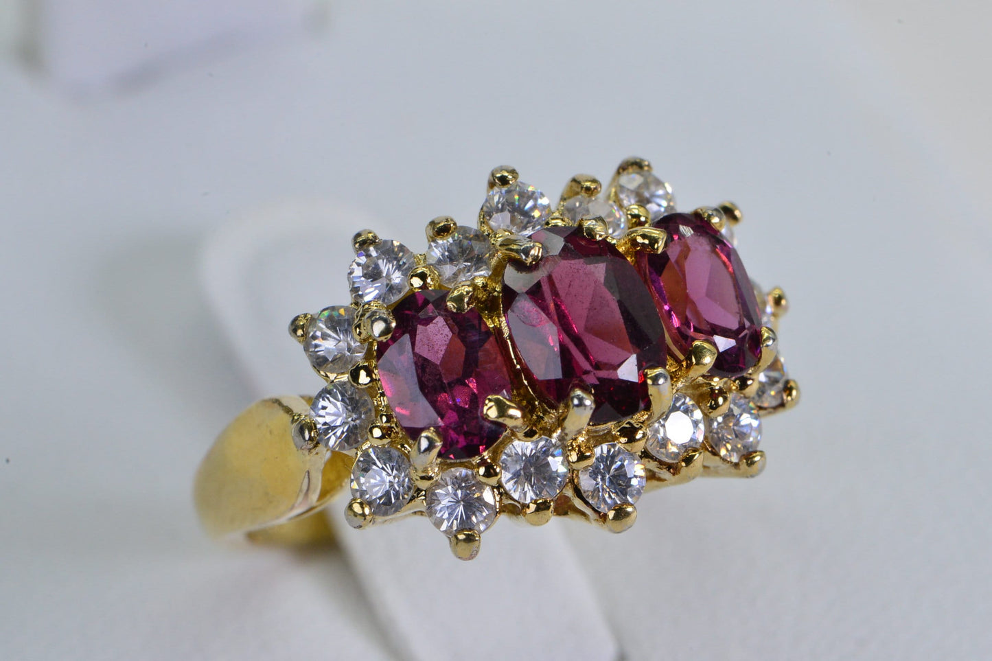 Vintage Garnet Trilogy Ring: 24K Gold Over Sterling Silver, Simulated Diamond Halo