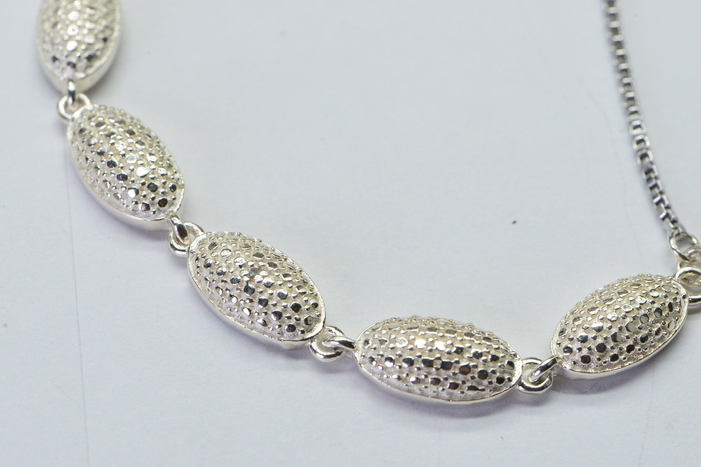 Sterling Silver Illusion Diamond Bolo Bracelet: Adjustable Oval Link