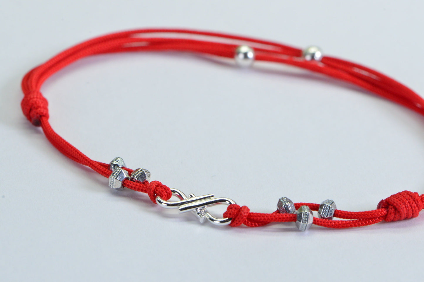 Red Braided Cord Bracelet: Sterling Silver Plated Infinity Charm