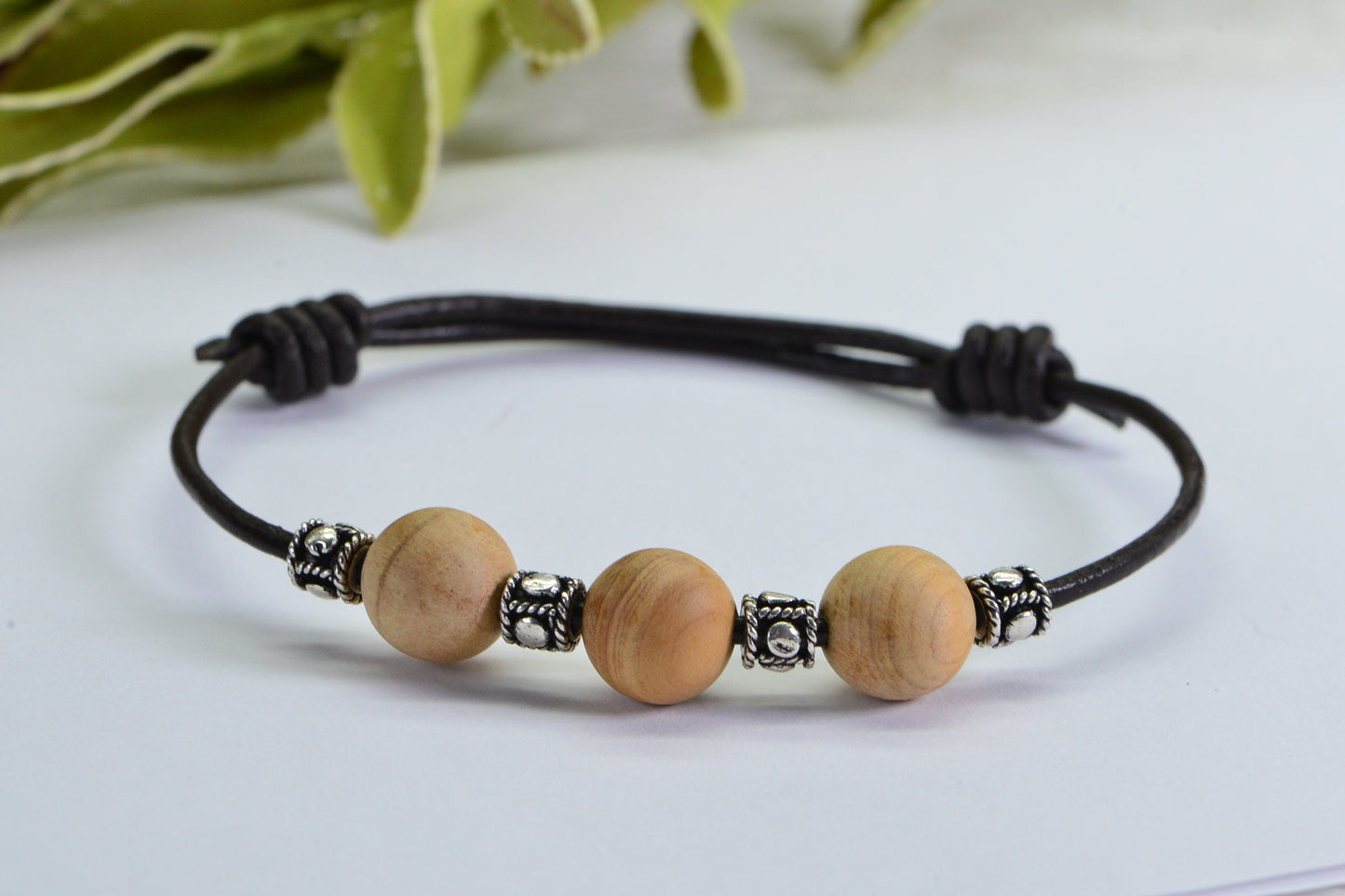 Sandalwood Bead Bracelet: Leather Cord, Sterling Silver Accents
