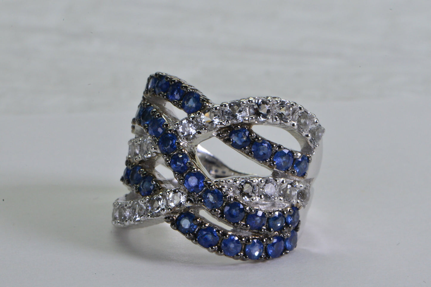 Sapphire Crossover Ring: Sterling Silver Wide Band with White Topaz