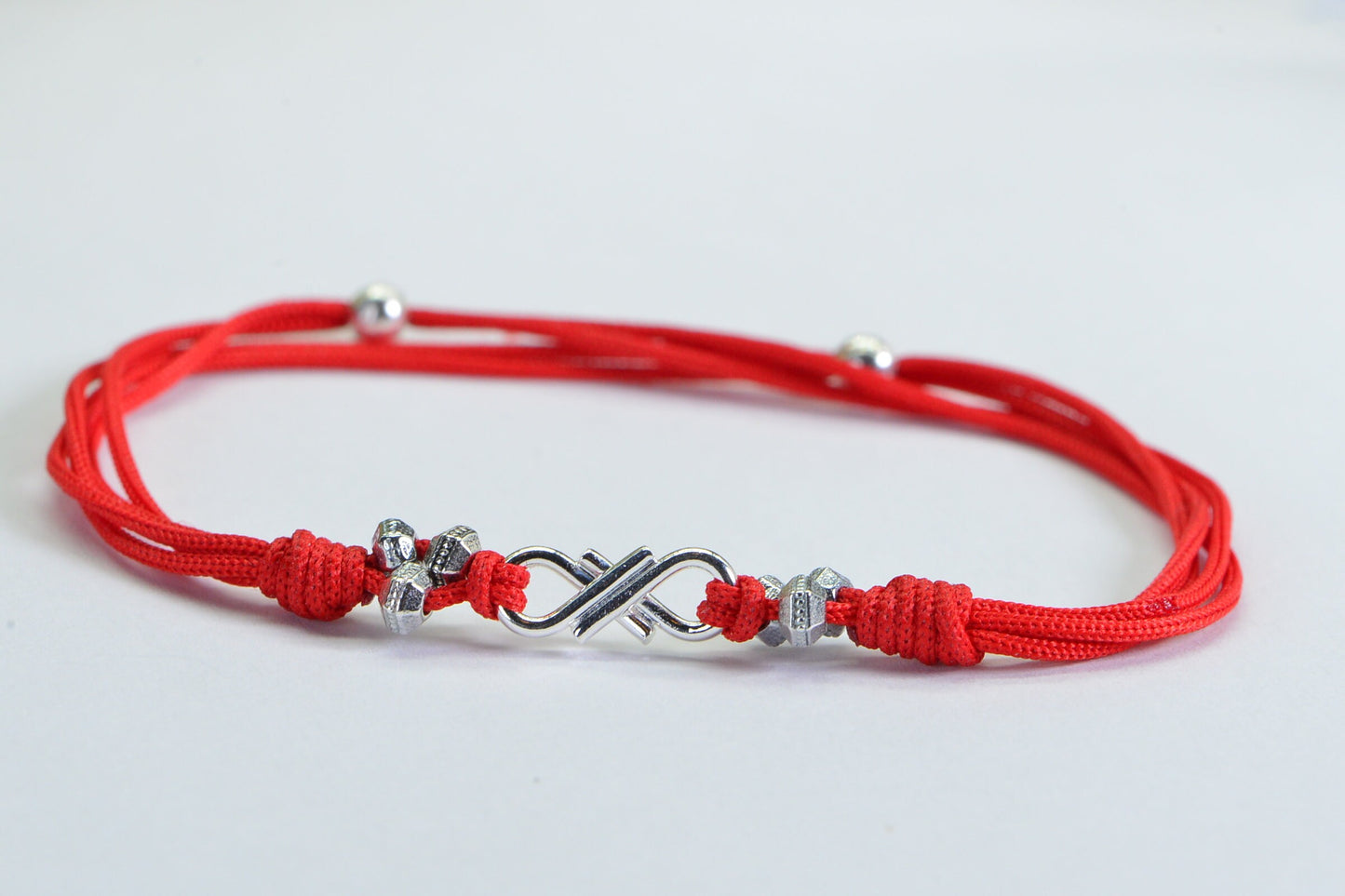 Red Braided Cord Bracelet: Sterling Silver Plated Infinity Charm