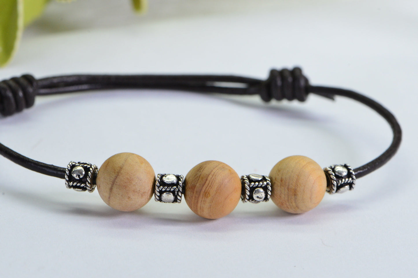 Sandalwood Bead Bracelet: Leather Cord, Sterling Silver Accents