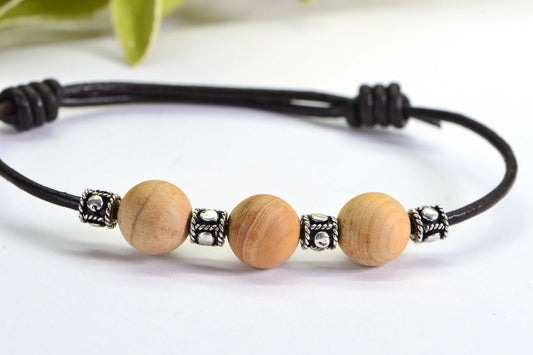 Sandalwood Bead Bracelet: Leather Cord, Sterling Silver Accents