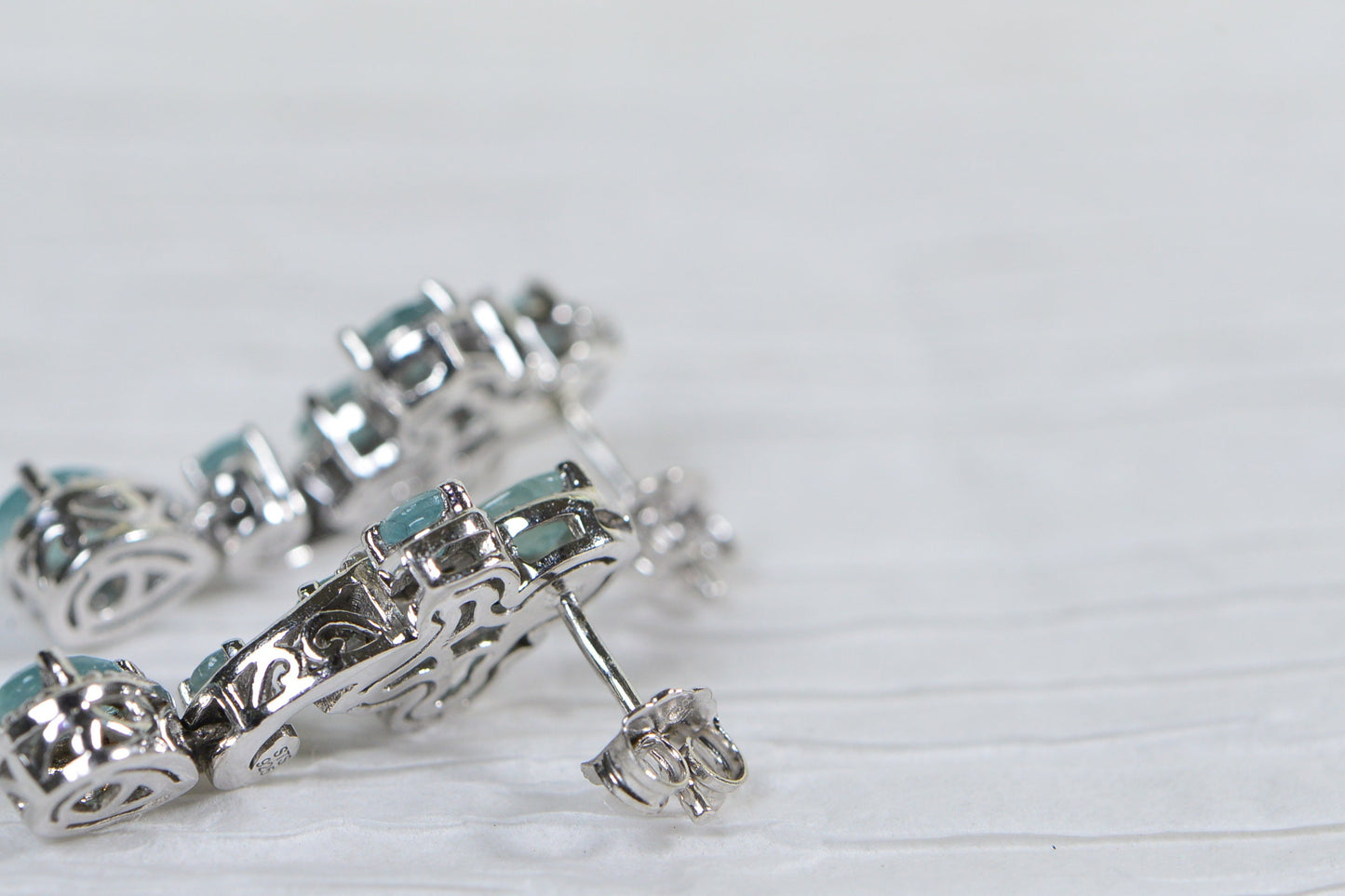 Butterfly Grandidierite Teardrop Earrings: Diamond Platinum over Sterling Silver
