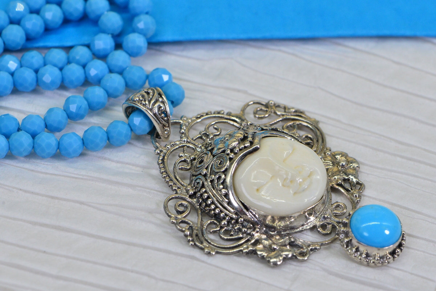 Bone Carved Cameo Moon Face Necklace: Sleeping Beauty Turquoise, Sterling Silver