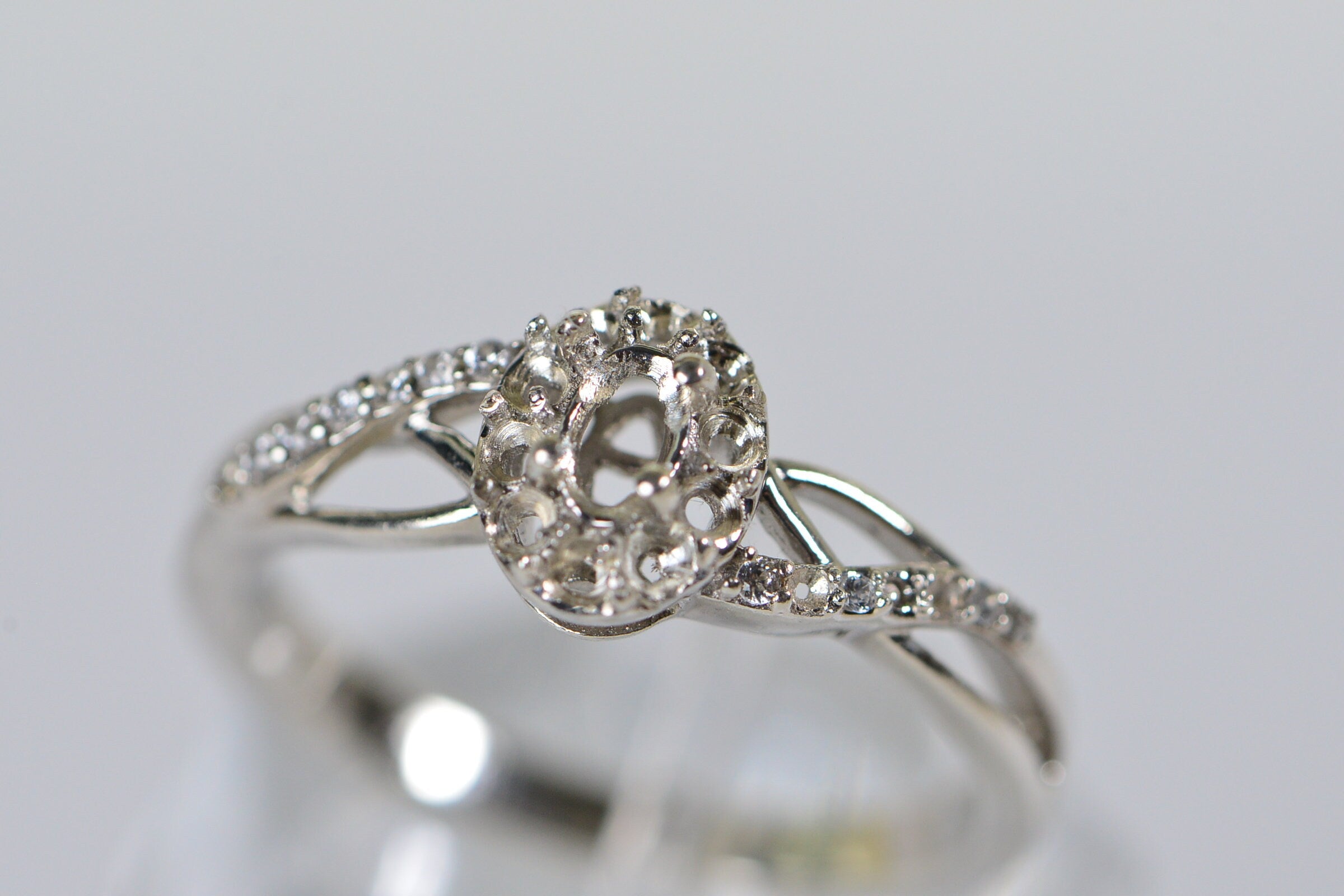 Sterling Silver Halo Ring Setting: Oval Cut, 4-Prong, Size 8