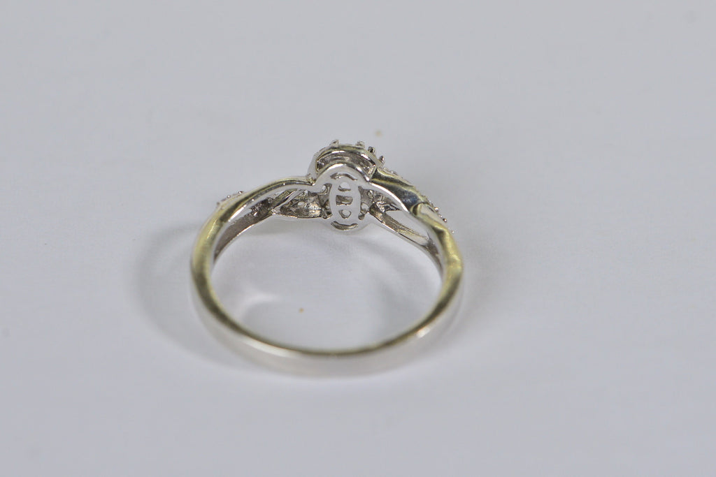 Sterling Silver Halo Ring Setting: Oval Cut, 4-Prong, Size 8