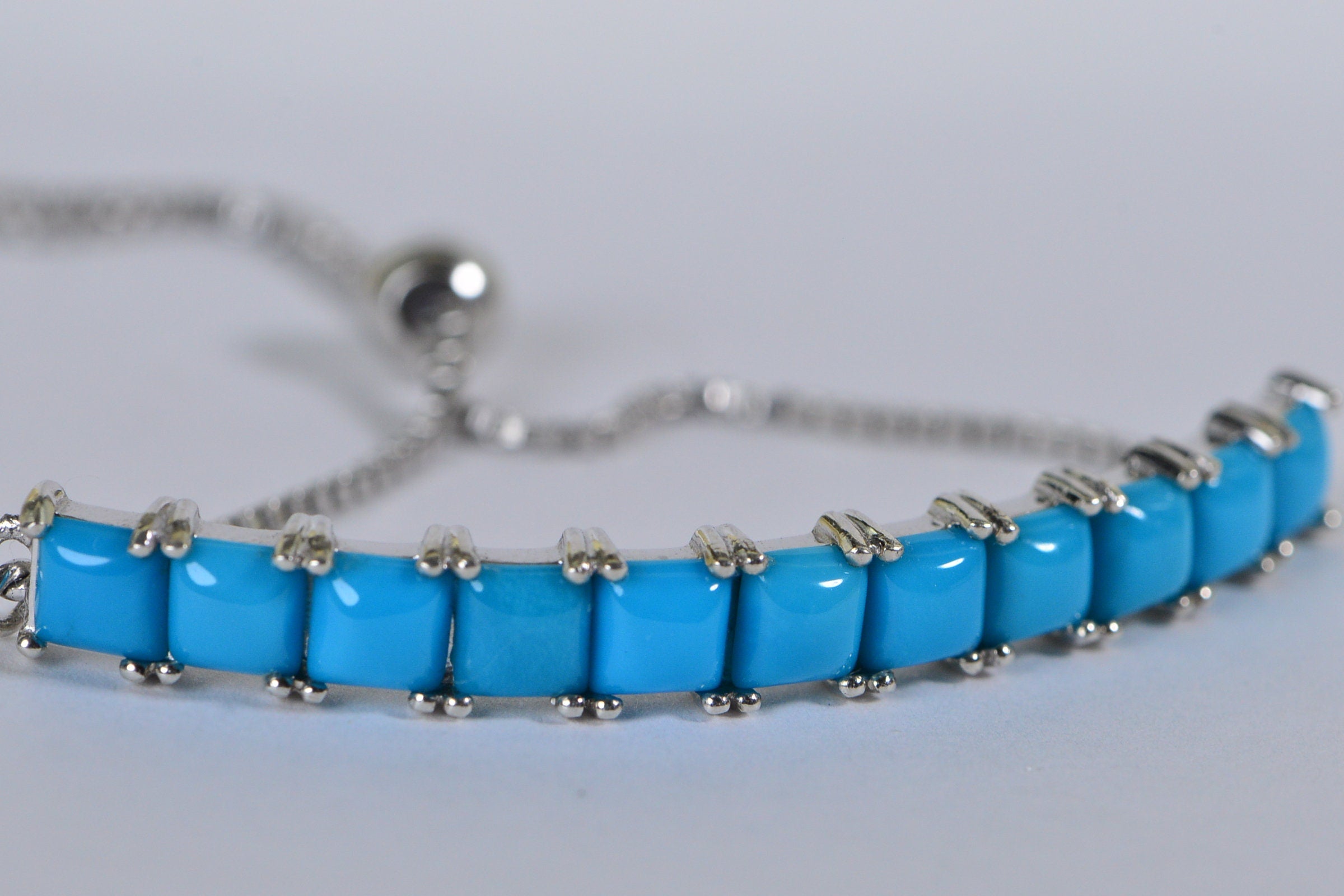 Sleeping Beauty Turquoise Bracelet: Sterling Silver Adjustable Bolo, Cushion Cut
