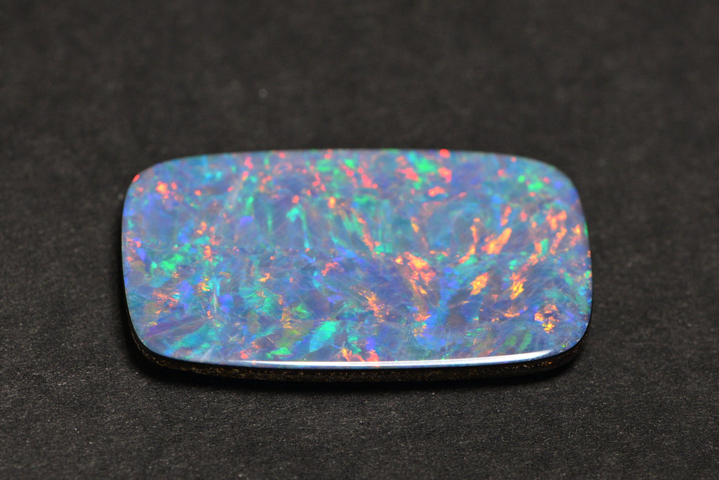 Australian Black Opal Doublet: 28.22CT Rectangle Cabochon, Metallic Rainbow
