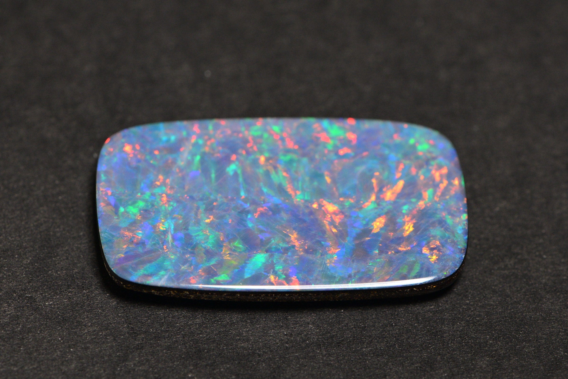 Australian Black Opal Doublet: 28.22CT Rectangle Cabochon, Metallic Rainbow