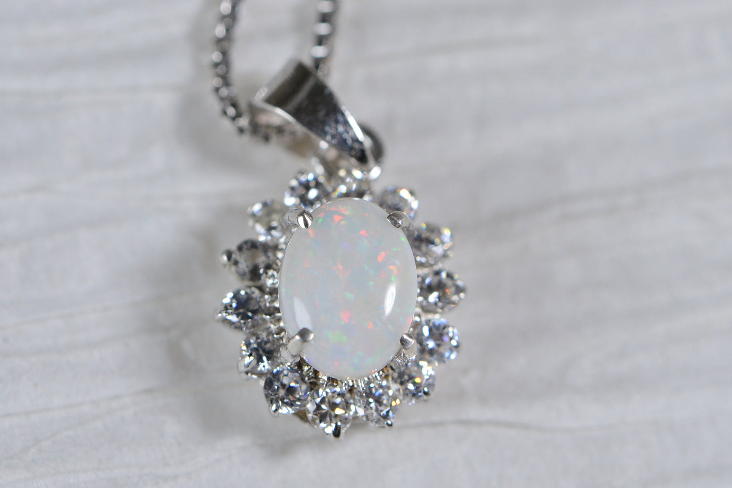 Australian Opal Pendant: 14K White Gold over Sterling Silver Halo