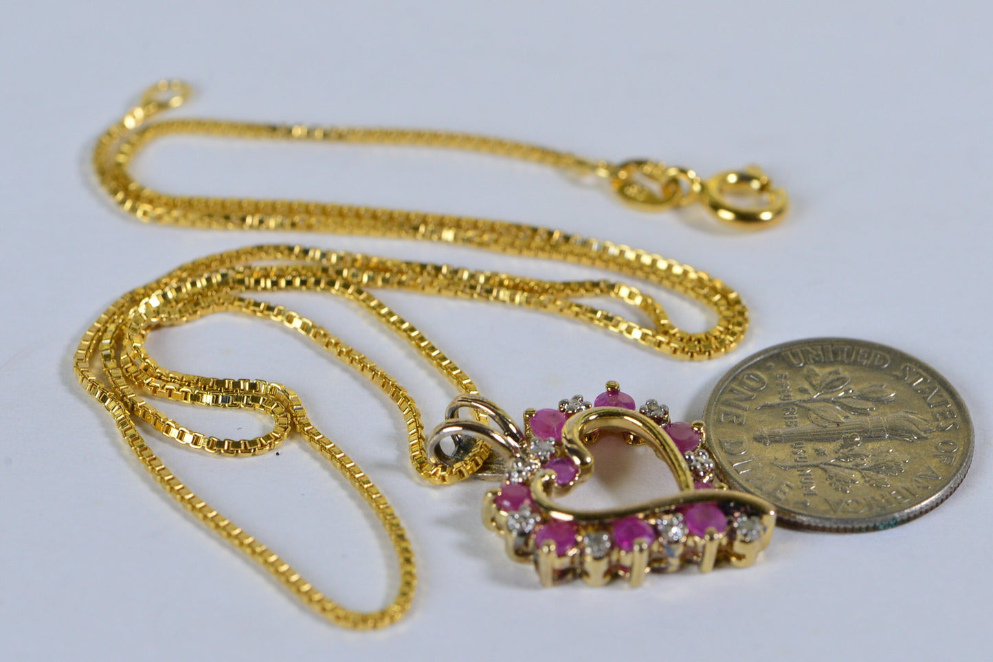 Ruby Heart Pendant: Diamond Accent, 14K Gold Over Sterling Silver