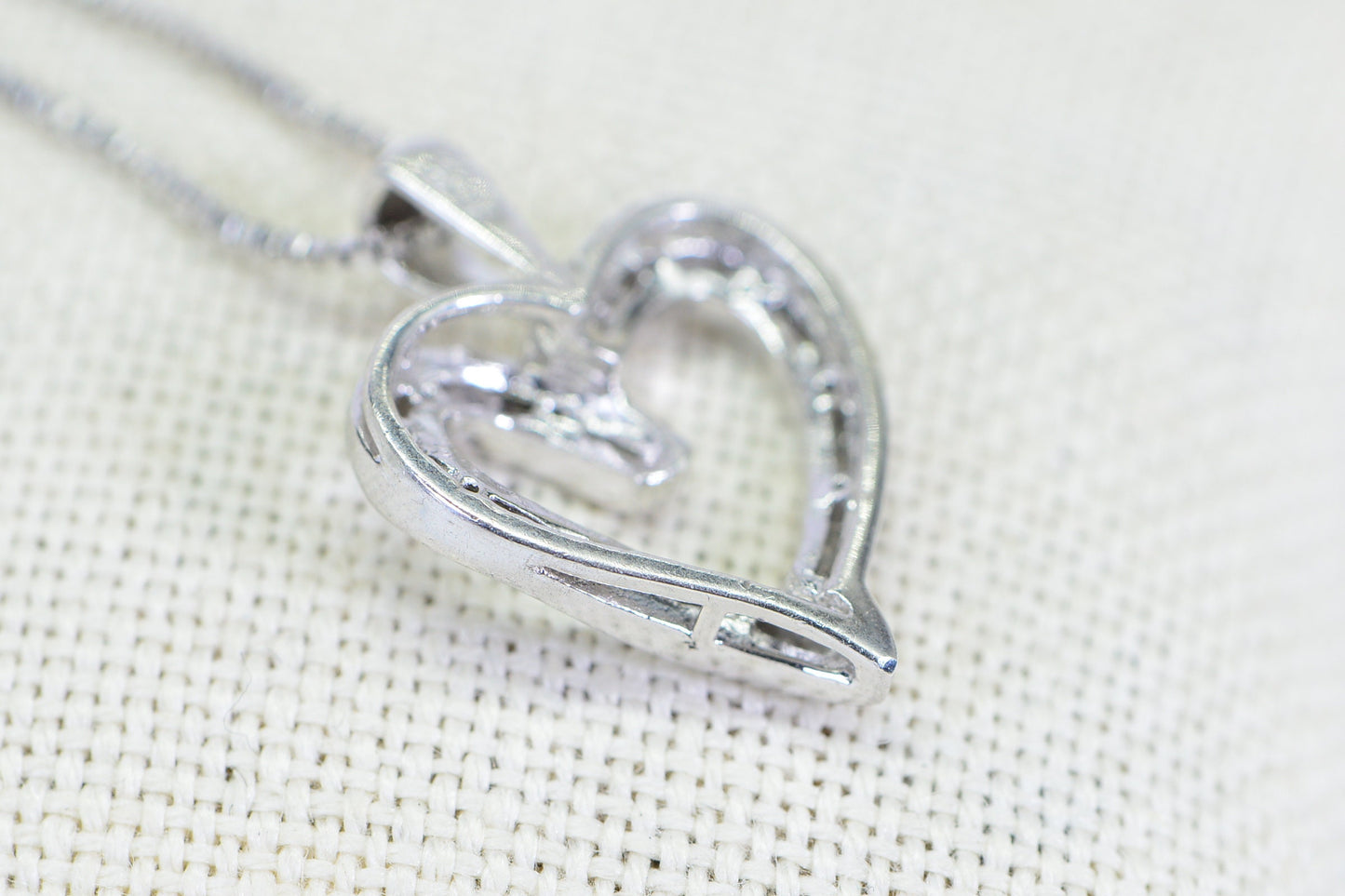 Diamond Heart Pendant Necklace: 14K White Gold over Sterling Silver