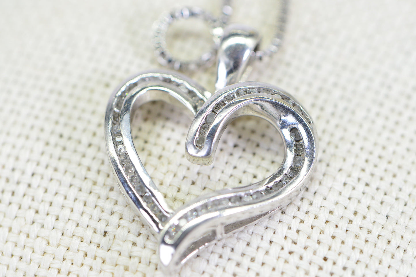 Diamond Heart Pendant Necklace: 14K White Gold over Sterling Silver