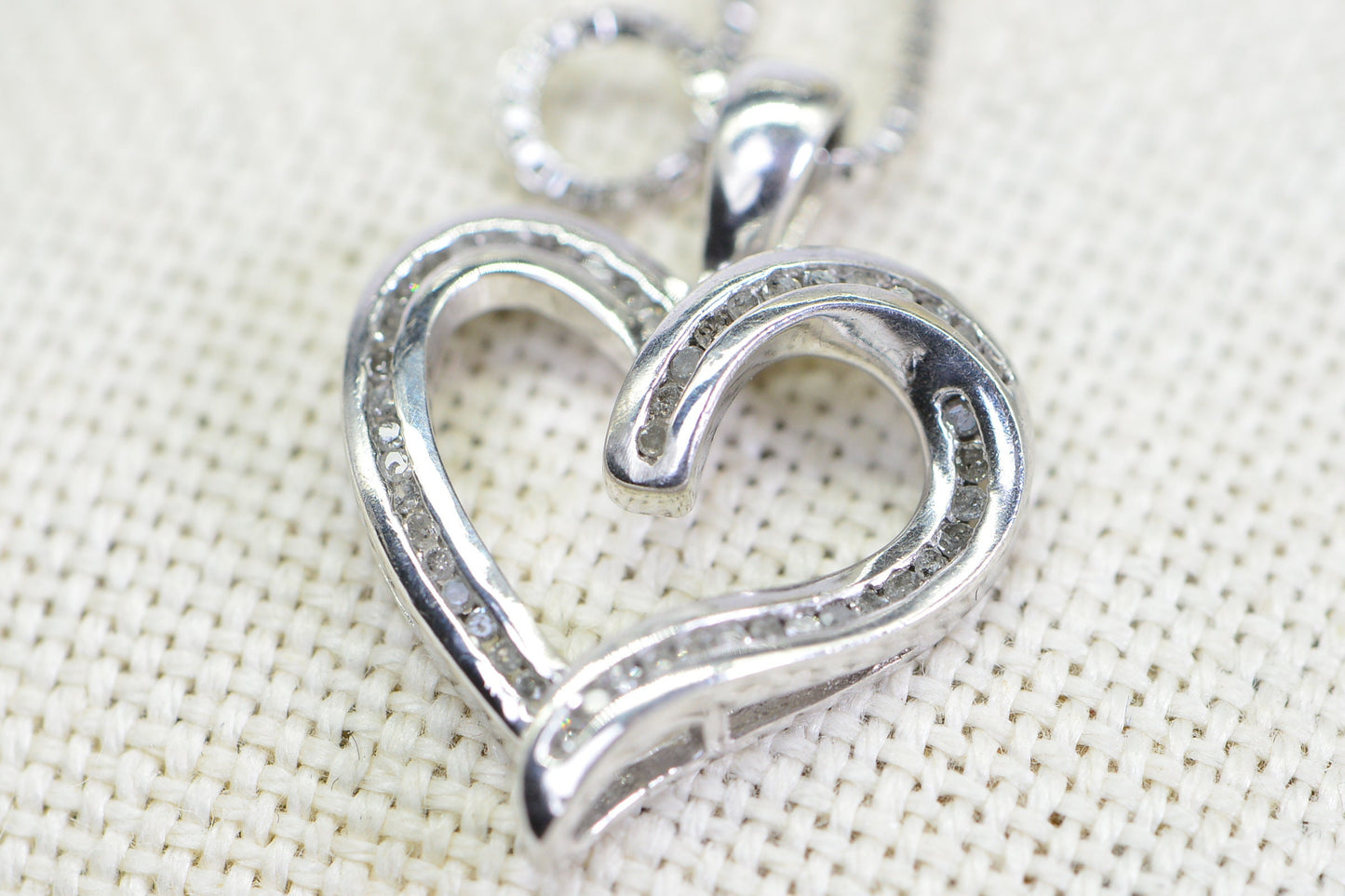 Diamond Heart Pendant Necklace: 14K White Gold over Sterling Silver