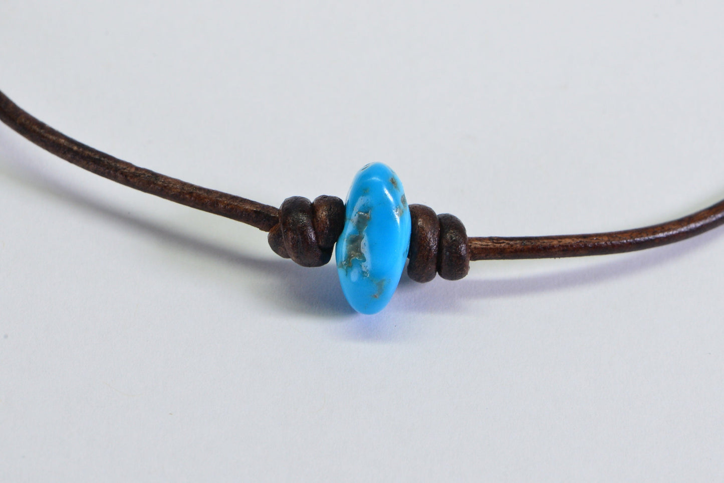 Sleeping Beauty Turquoise Bracelet: Leather Cord, Sterling Silver Clasp
