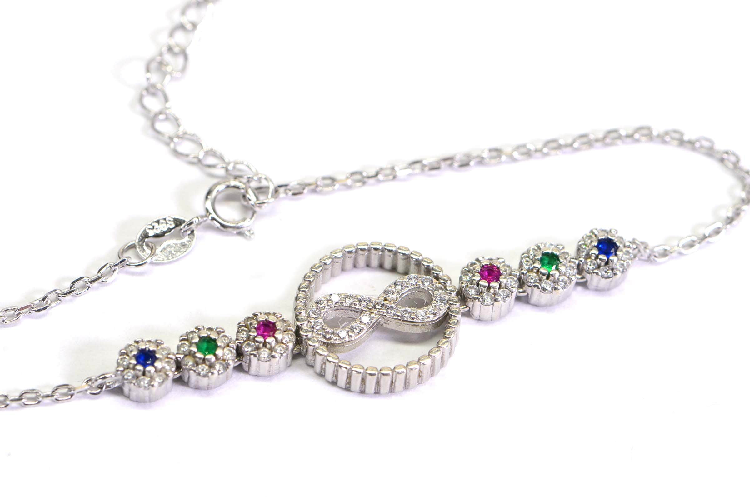 Sterling Silver Infinity Bracelet: Simulated Diamond, Ruby, Sapphire, Emerald