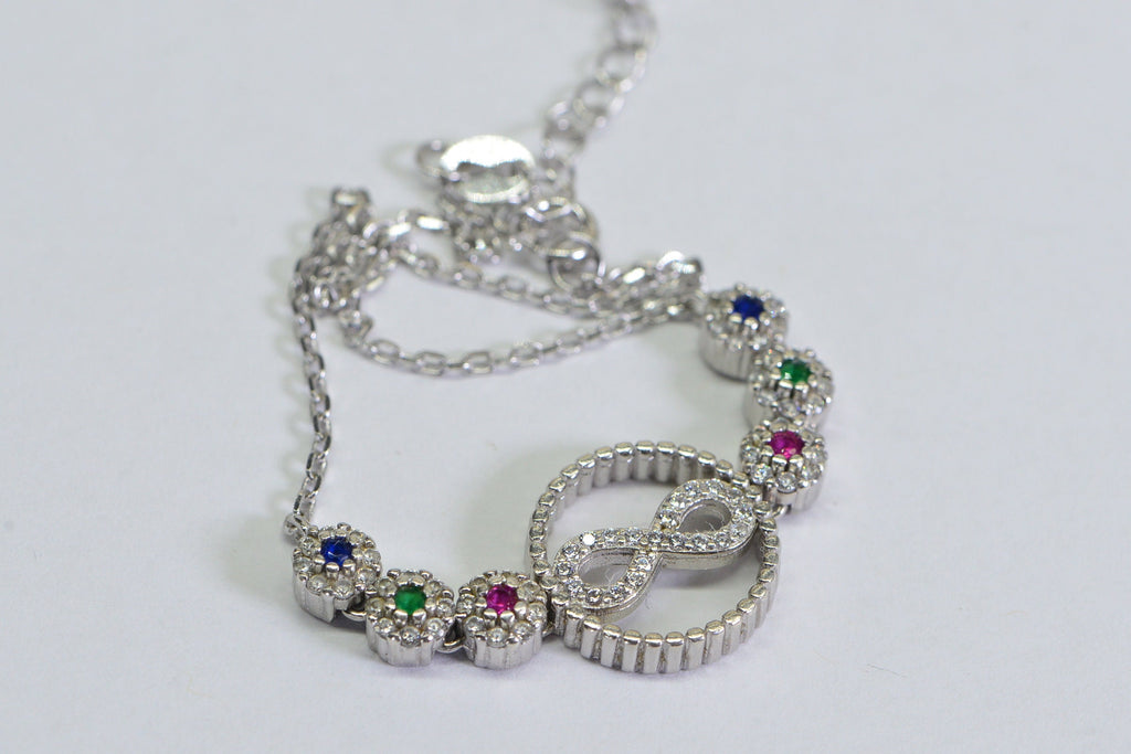Sterling Silver Infinity Bracelet: Simulated Diamond, Ruby, Sapphire, Emerald