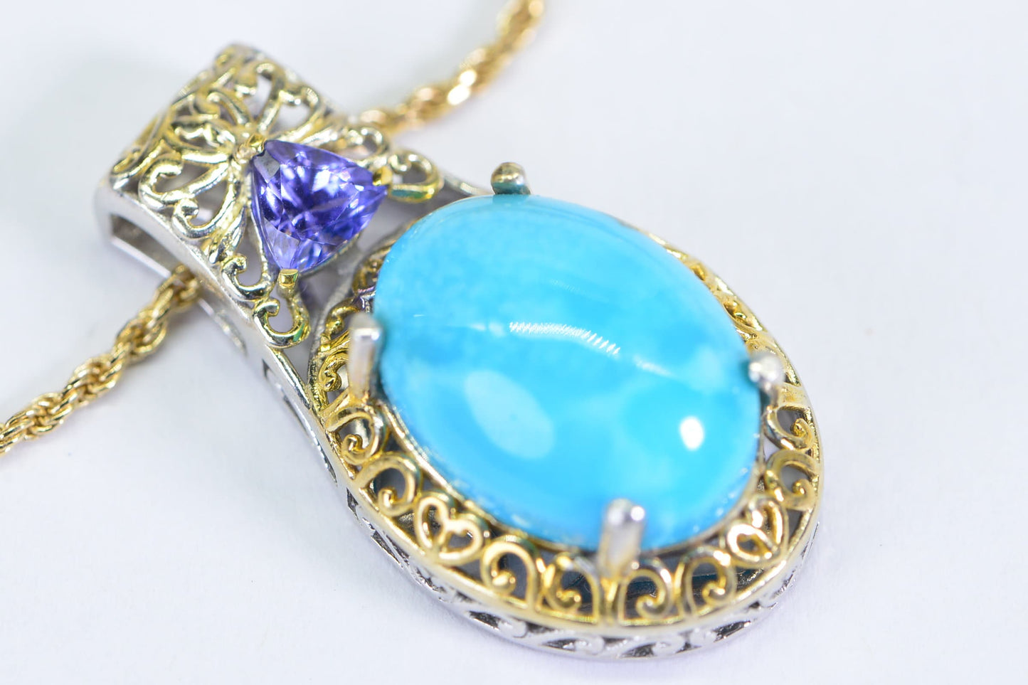 Sleeping Beauty Turquoise Tanzanite Pendant: 24K Gold Over Sterling Silver