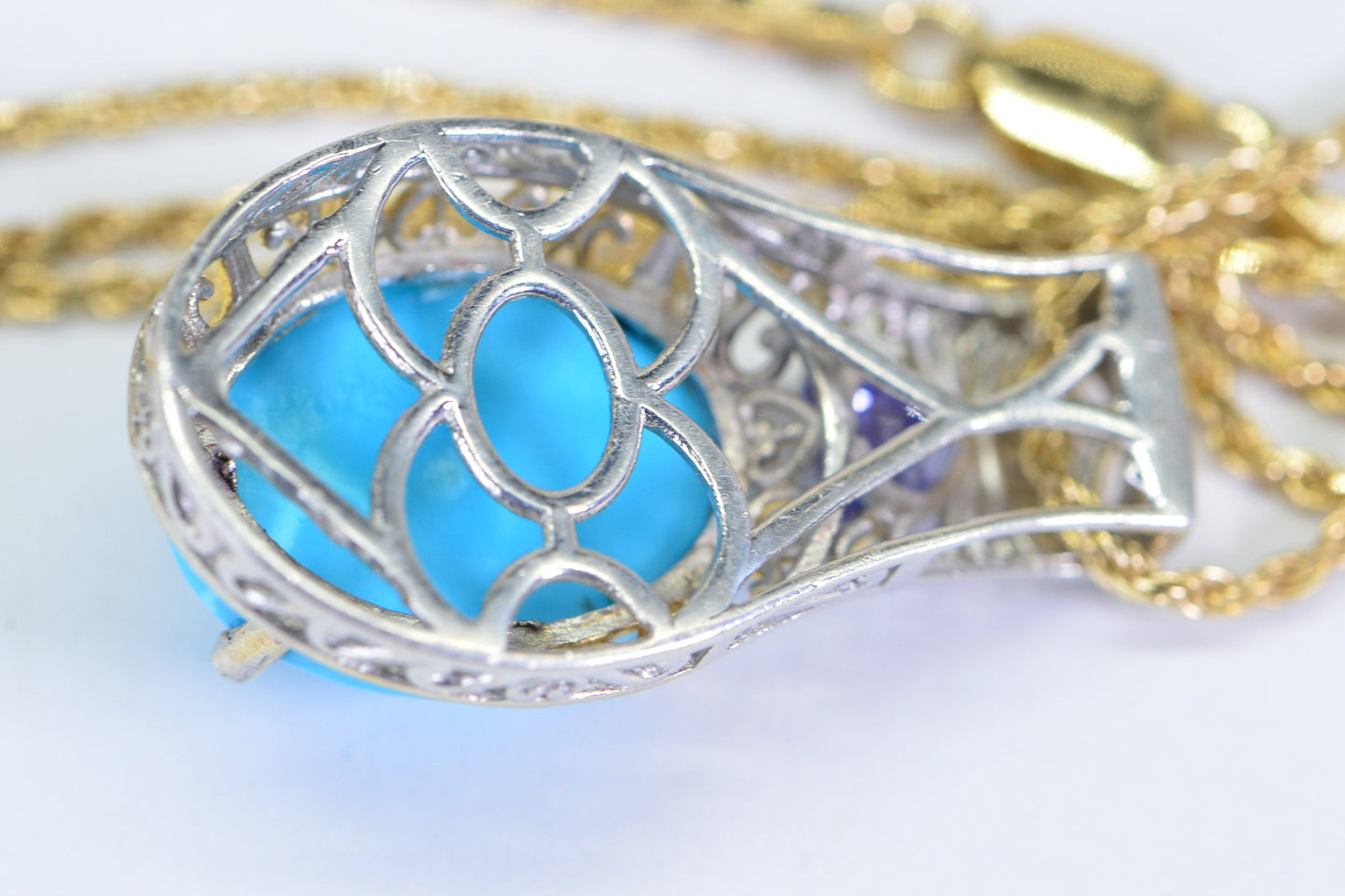 Sleeping Beauty Turquoise Tanzanite Pendant: 24K Gold Over Sterling Silver